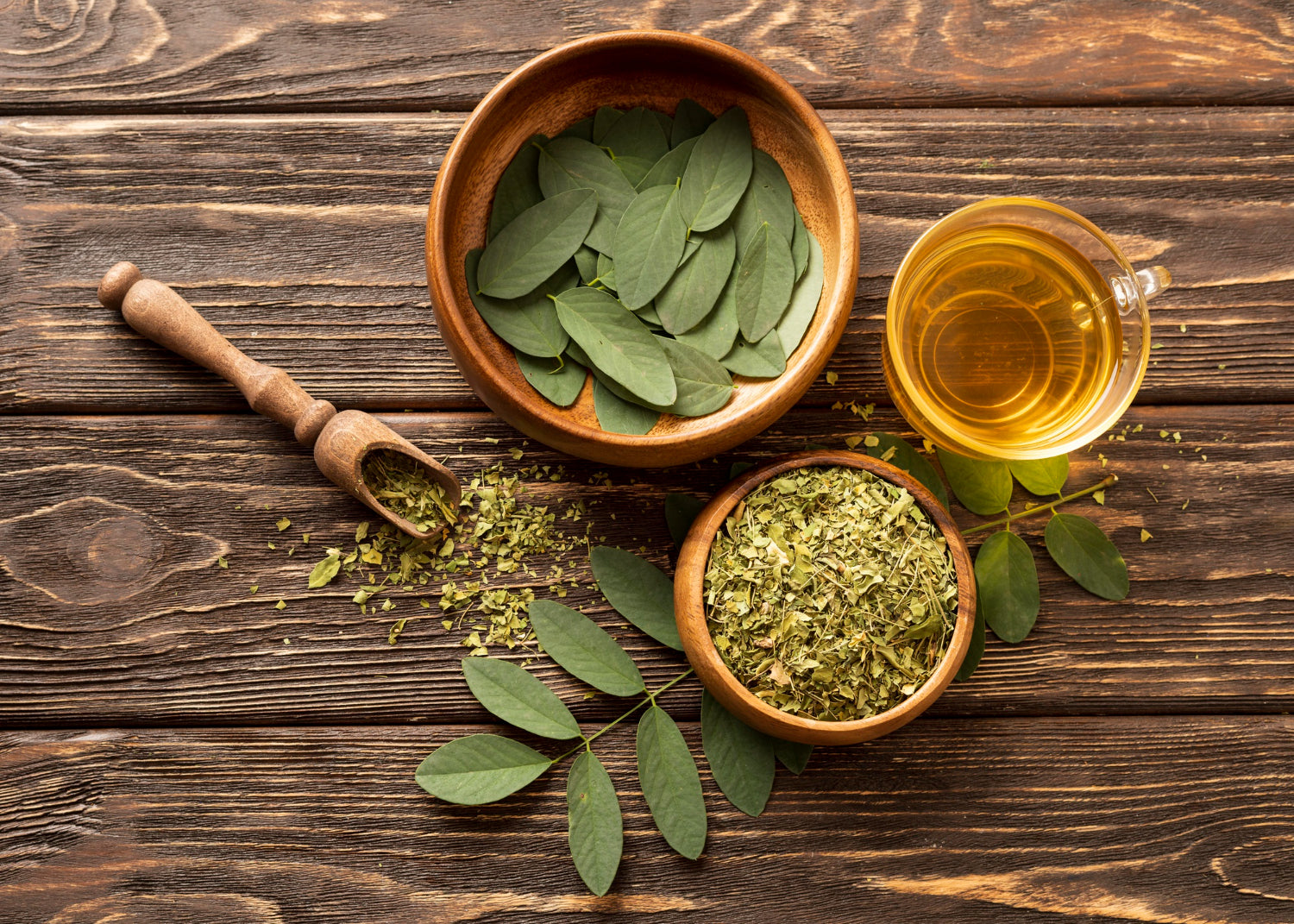 top-view-green-leaves-cup-tea